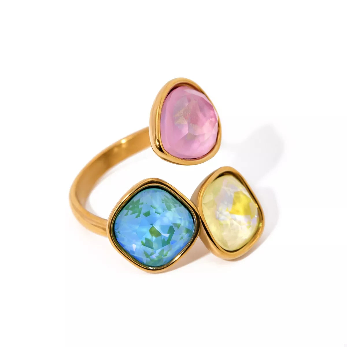 Adjustable 18k gold plated ring with pink, blue, and yellow gemstone rhinestones in a bypass design on white background
