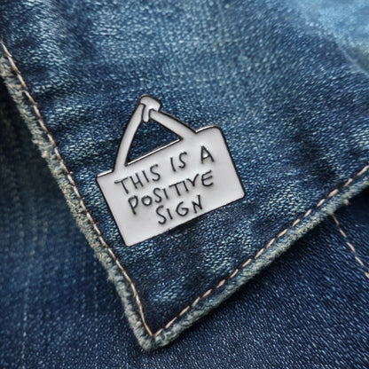 “This Is A Positive Sign” Enamel Pin